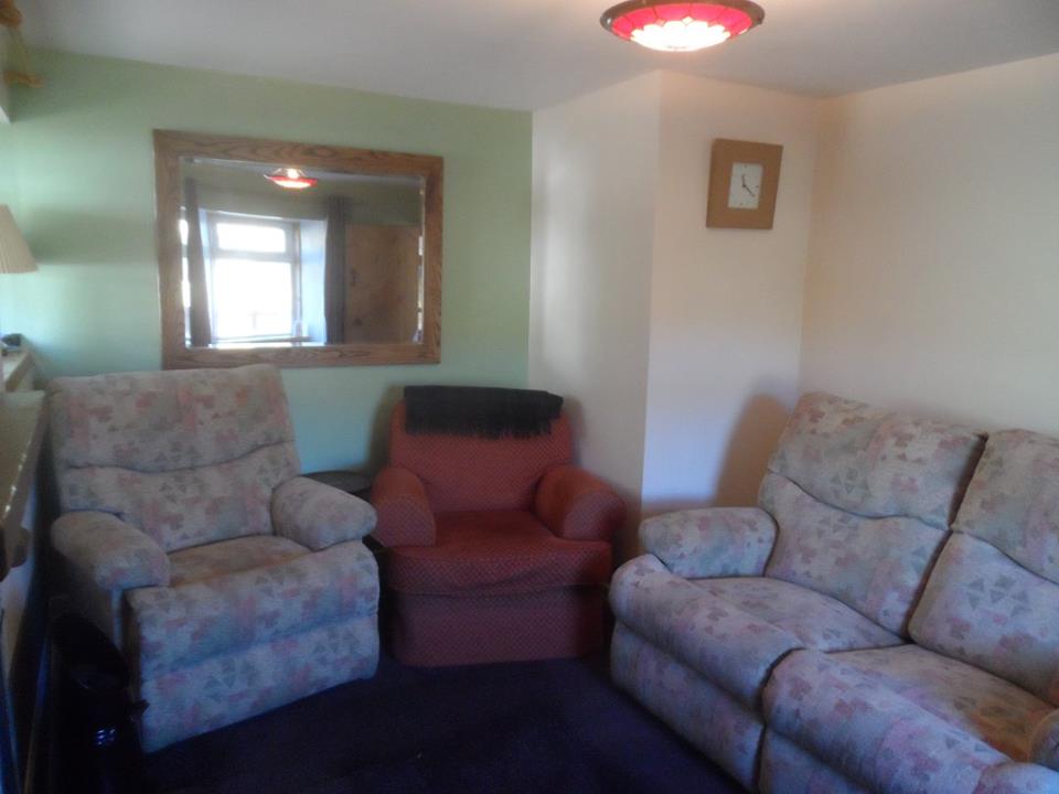 Three sitting room chairs